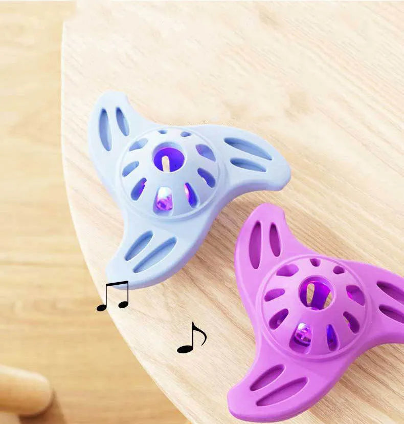 Boomerang-shaped dog chew toy with textured molar edges in purple colour
