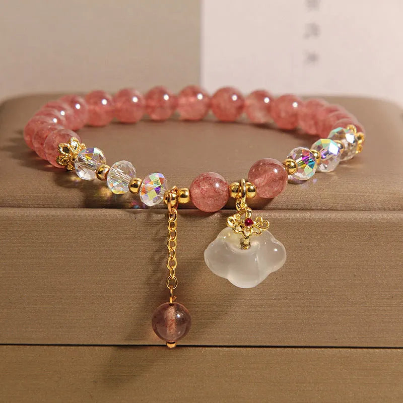 Women's natural crystal bracelet with strawberry quartz and white agate beads featuring auspicious cloud design