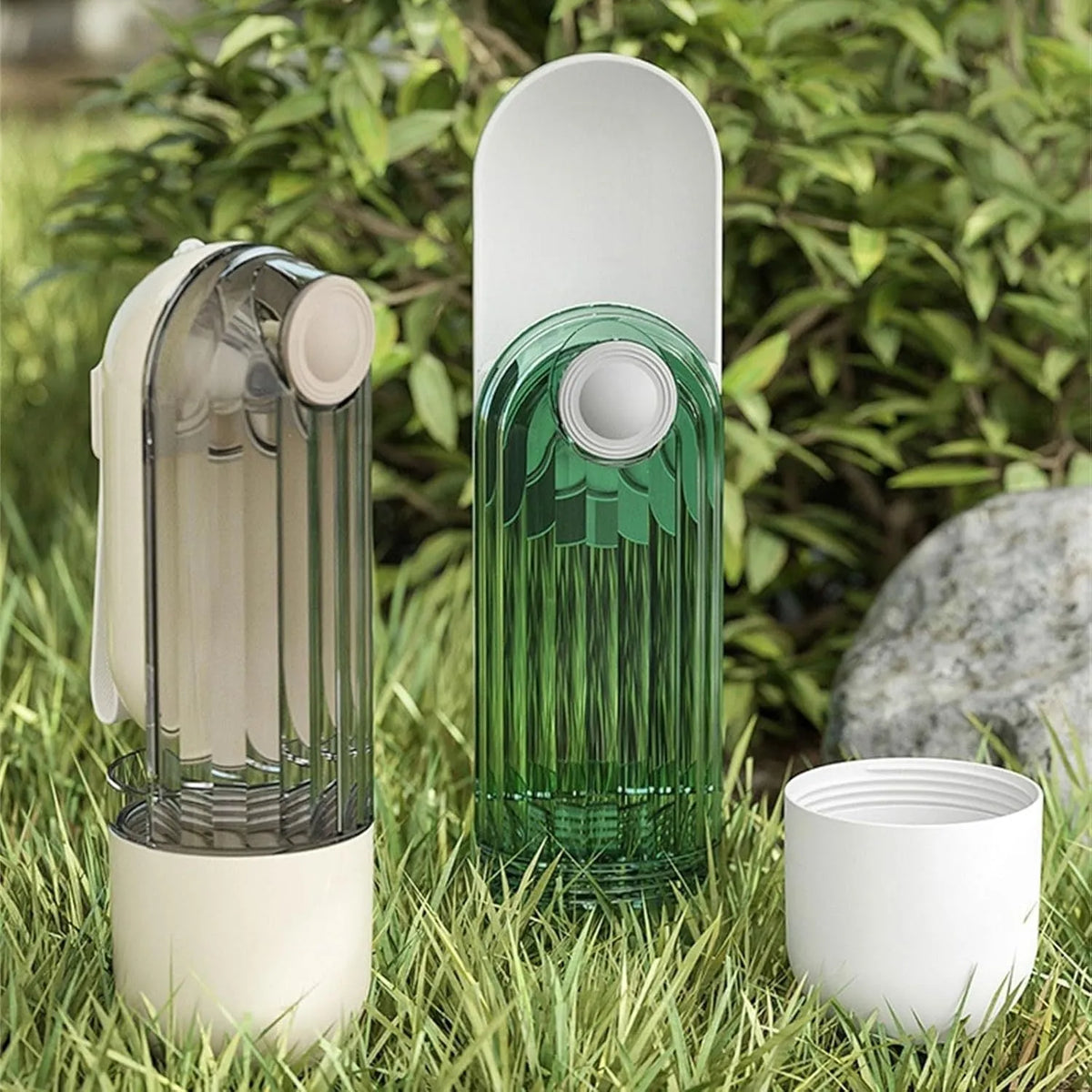 Beige foldable dog water bottle with food dispenser shown next to a dog on a walk
