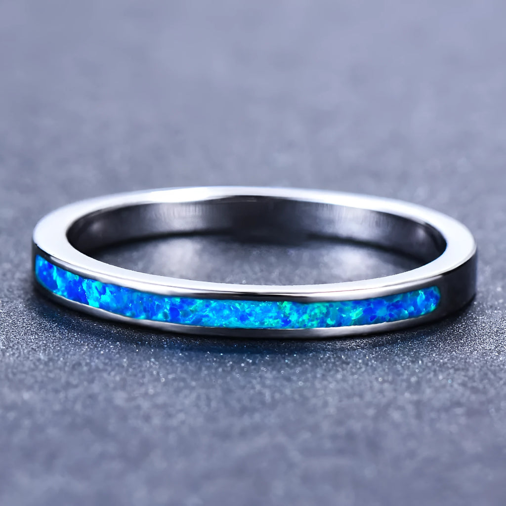 Copper ring with round blue opal stone, geometric simple design
