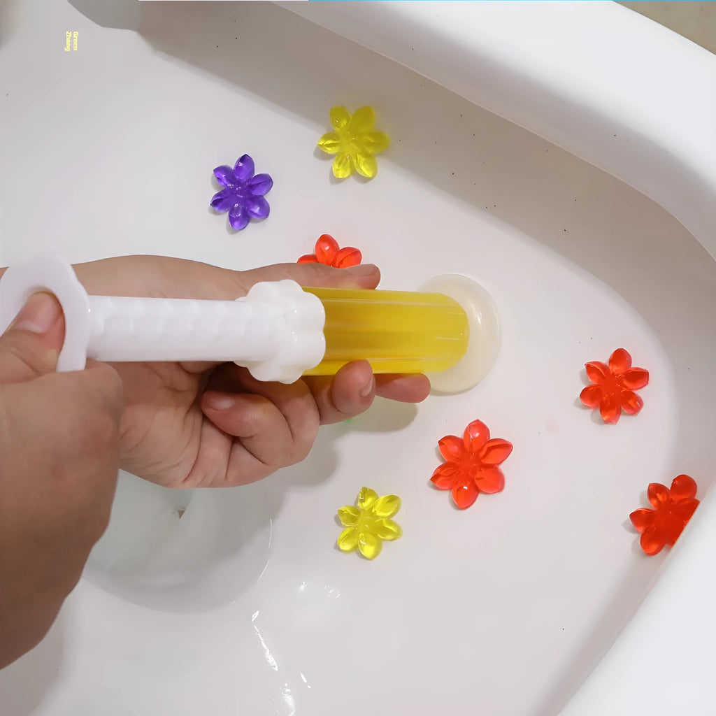 38g toilet gel deodoriser with 12 flower petal aroma blocks in nine scent options including Red Rose and Blue Sea