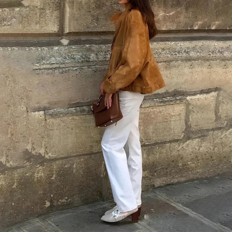 Loose fit solid colour retro jacket with long sleeves on mannequin