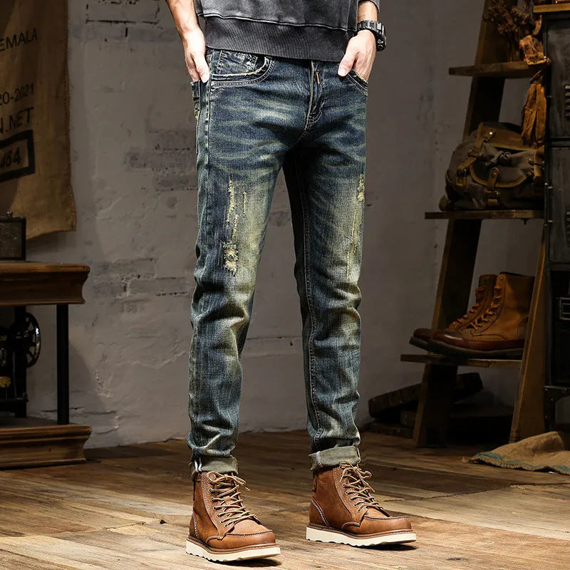 Man wearing retro coloured stretch cotton denim skinny fit jeans with a zip fly.