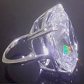 Women's alloy ring with electroplated white gold colour finish and geometric inlaid square diamond design