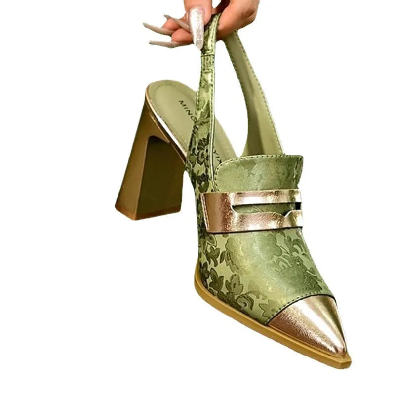 Women's black printed high heel sandals with chunky heel, pointed toe and high-cut straps.