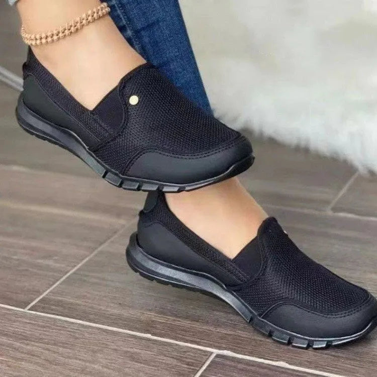 Canvas slip-on loafers for women flat heel round toe patent leather finish available in multiple colours