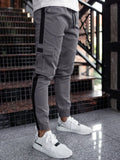 Men's leather-look casual trousers, mid waist, zip fly, 65% polyester, khaki black dark grey, sizes S to 2XL