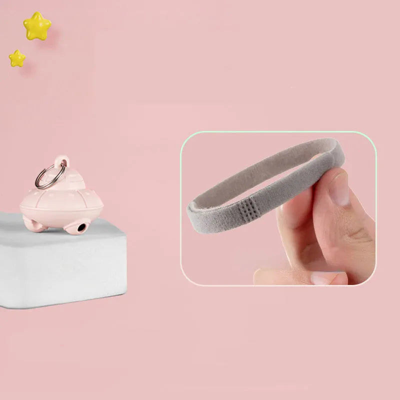 Green cat collar laser toy with USB charging and 360° rotation on a pink cat collar