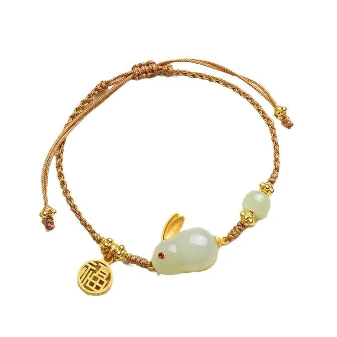 Hetian jade rabbit charm bracelet on yellow string with geometric shape