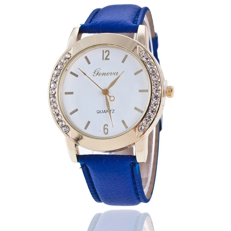 Geneva women's quartz watch with blue dial, round alloy case, and imitation leather strap on display