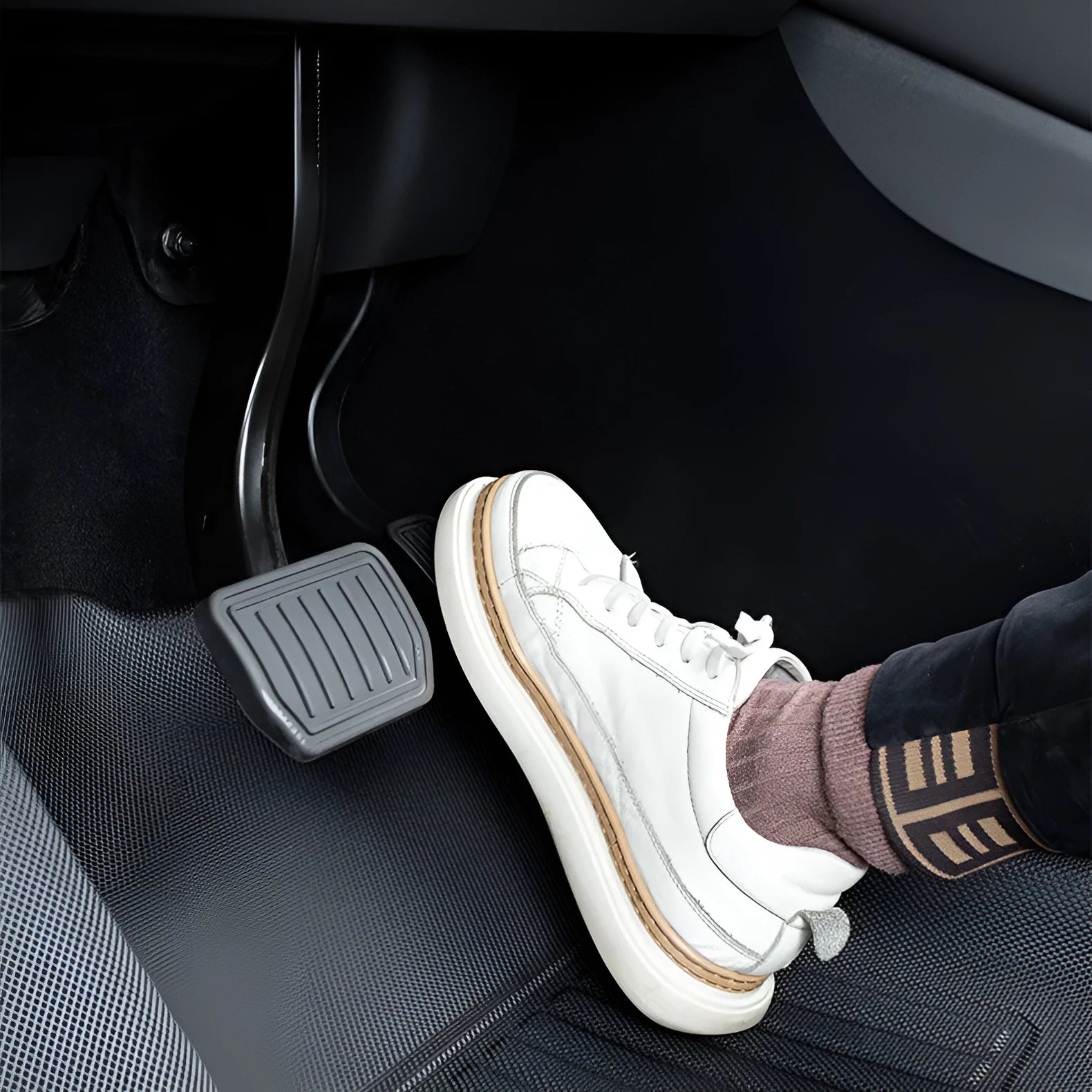 Tesla Model Y TPR floor mats showing foot mats, tailbox mats, and storage box mats
