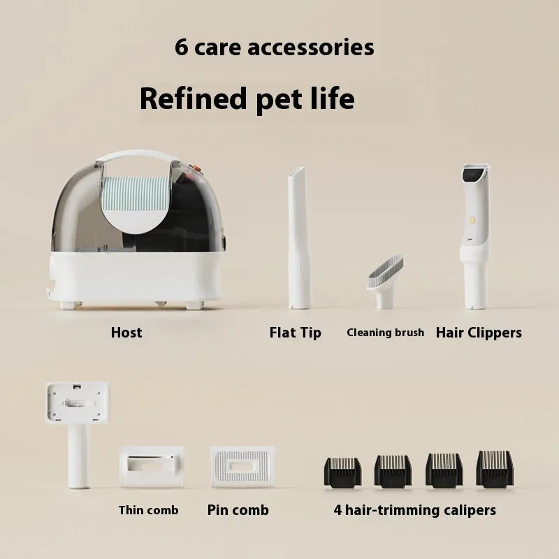 White pet grooming vacuum cleaner with attached shaver, hose, and set of grooming combs and calipers.