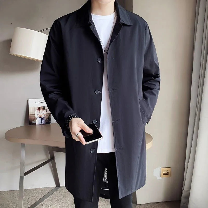 Man wearing a mid-length khaki loose-fit casual trench coat made of rabbit fur.