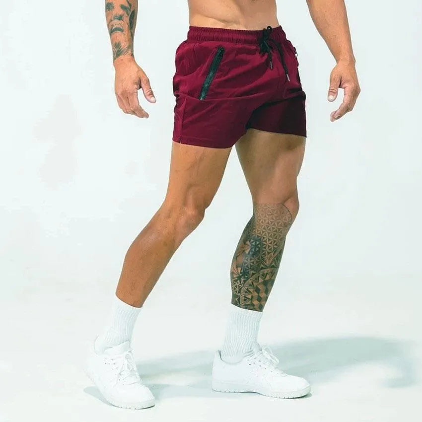 Men's summer quick dry polyester sports shorts in black with mid waist design