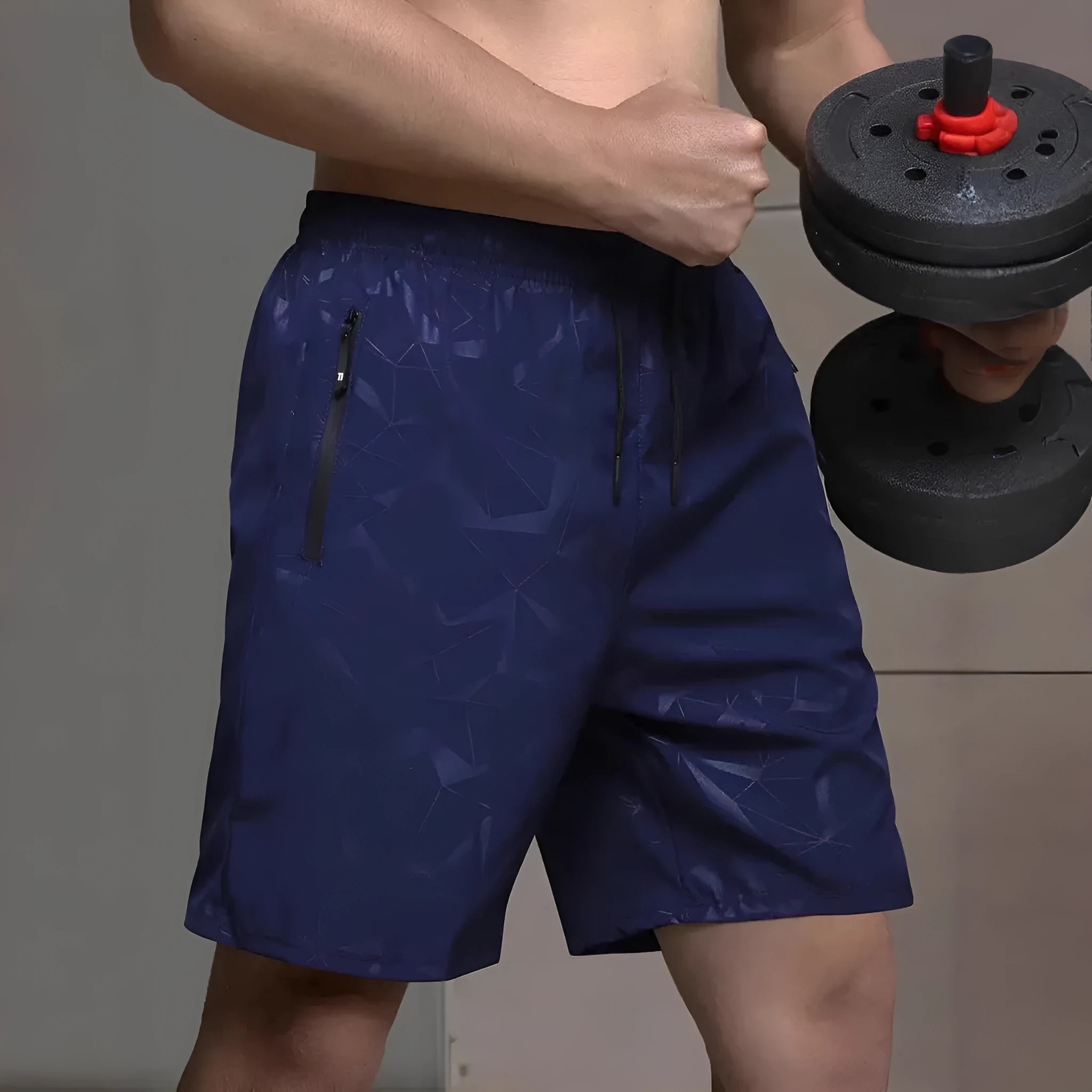 Men's loose fit sports shorts in polyester fabric with elastic waistband available in black, grey, and blue colours