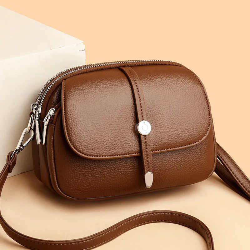 City Simple women's crossbody shoulder bag in soft PU, oval shape, black 2545 colour