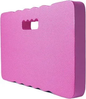 Blue EVA foam garden kneeler pad on grass, showing its rectangular shape and thickness for knee protection.