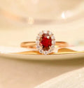 Sterling silver ladies ring with gold pigeon design and red blood ruby gemstone