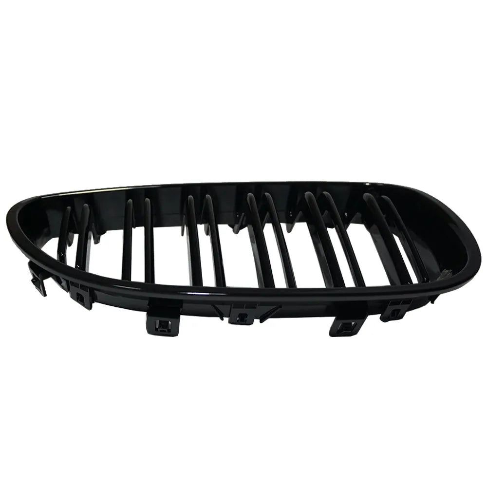 Pair of ABS carbon fibre pattern grilles for a BMW 5-Series front bumper.