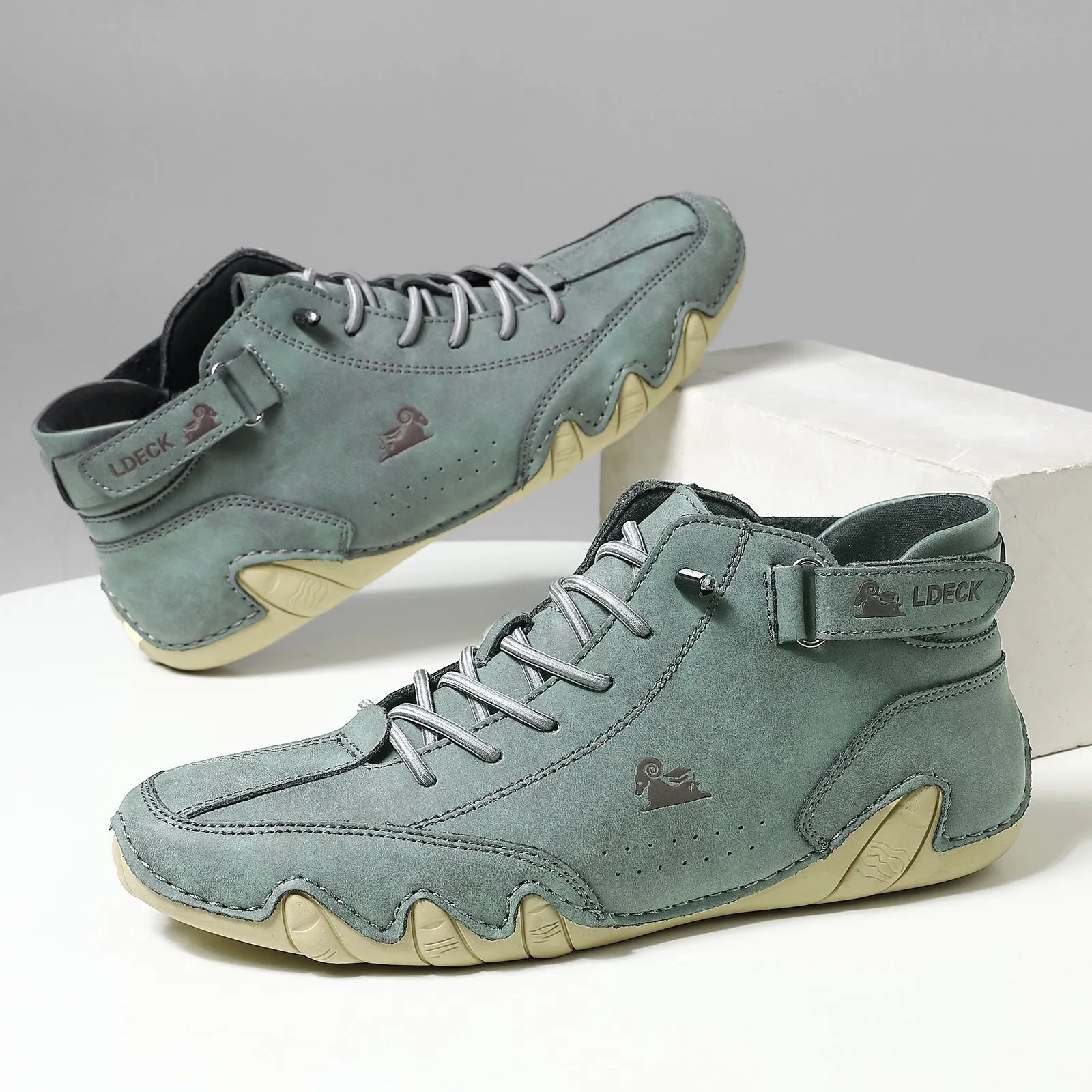 Octopus brand men's high-top ankle boots in khaki, grey, or black with a round toe and rubber sole.