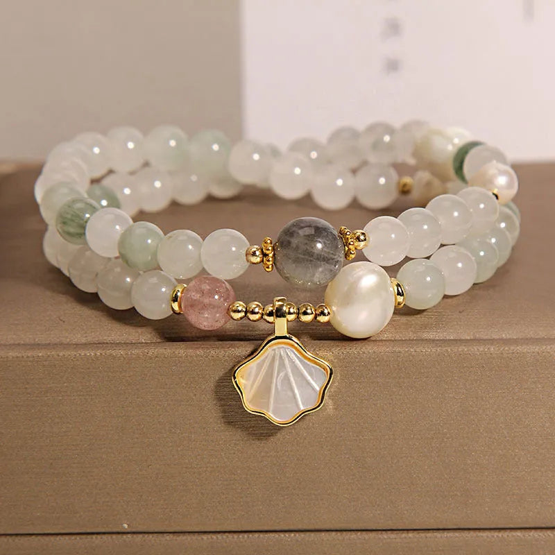 Tianshan emerald green crystal bracelet with gold-plated ginkgo leaf pendant and rhinestone accents