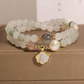 Tianshan emerald green crystal bracelet with gold-plated ginkgo leaf pendant and rhinestone accents