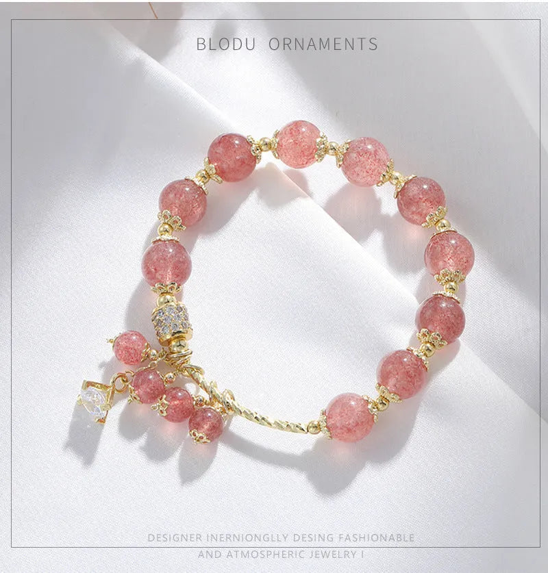 Pink strawberry quartz crystal bracelet with heart shapes and pearl accents for women
