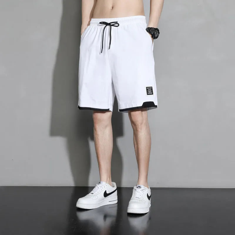 Cotton shorts for boys in plus sizes, showing mid waist and short length design in khaki colour.