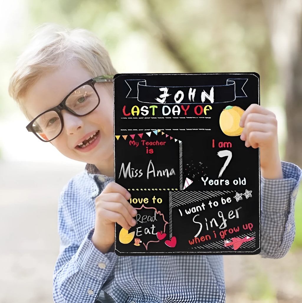 Black wooden First Day of School blackboard sign measuring 255mm by 300mm