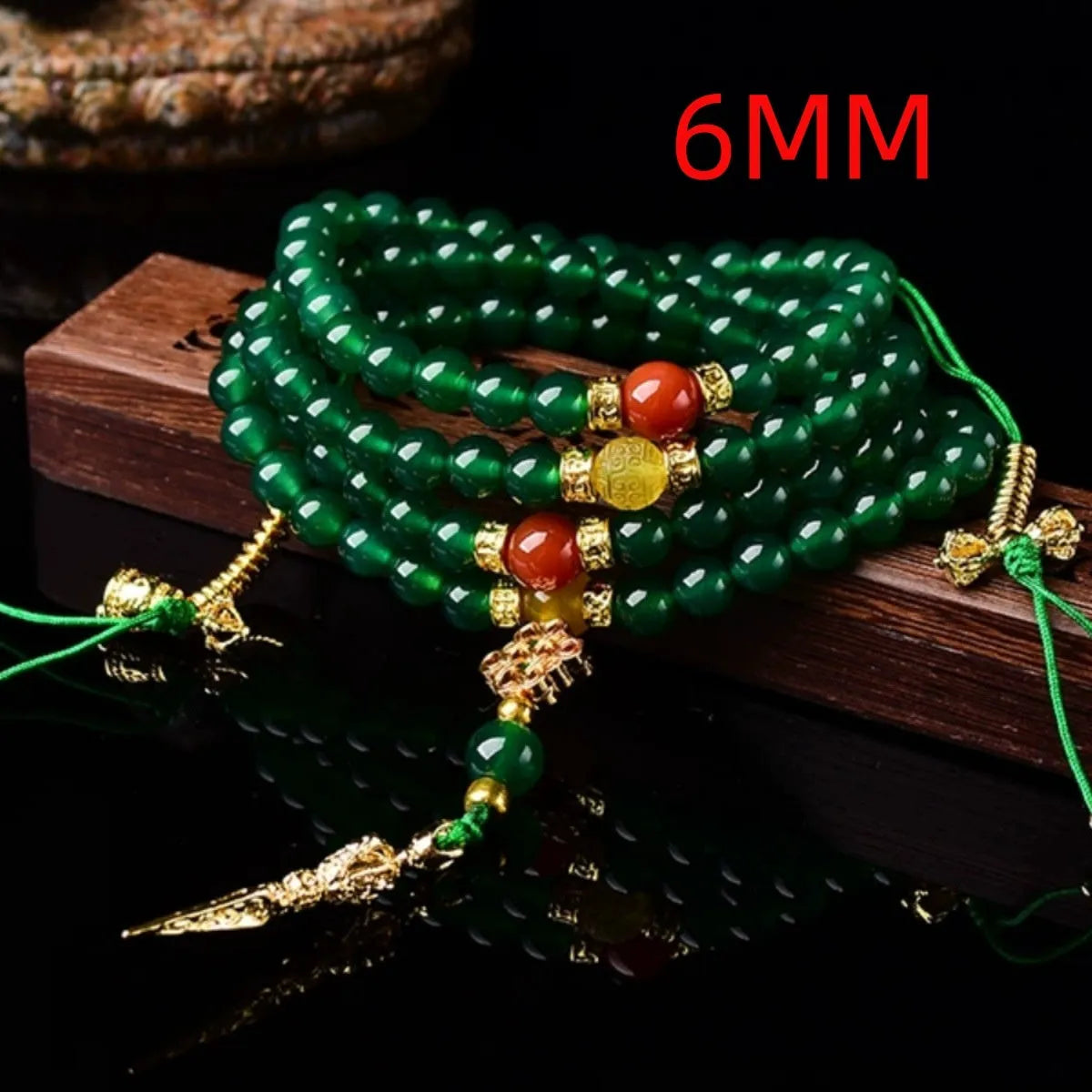 Multi-strand green agate bracelet for men and women on wrist, showing natural stone beads.
