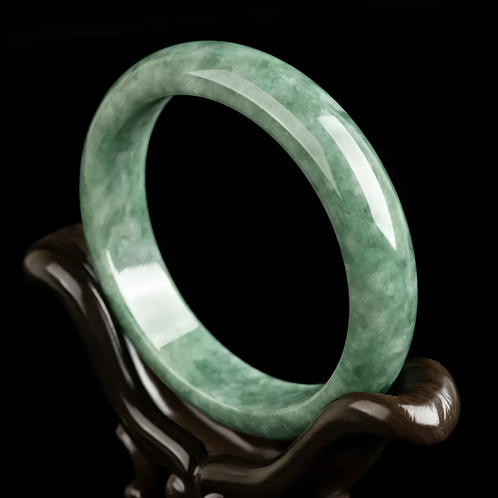 Natural emerald bean green jade beaded bracelet for women on a gift box.
