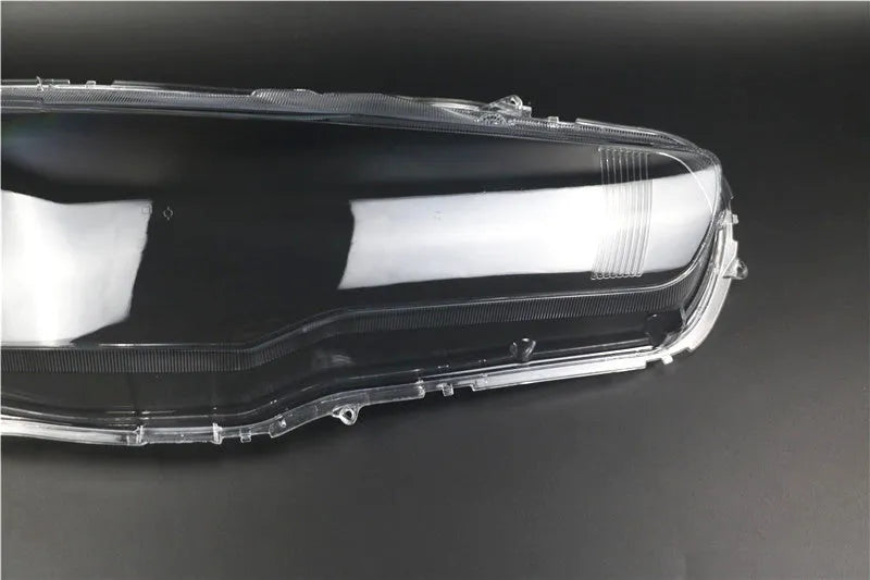 Transparent plastic headlight housing cover showing 50x30x20mm dimensions