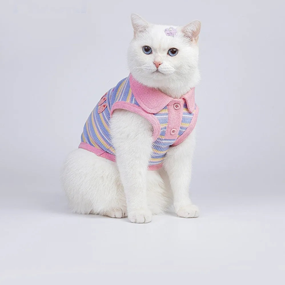Pink purple knitted vest for a small dog or cat on a mannequin.
