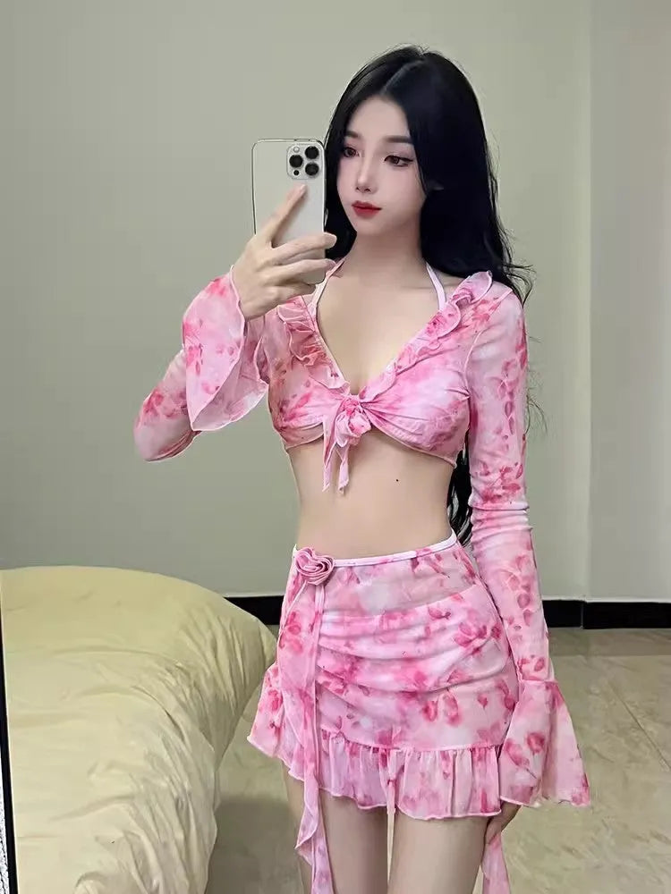 Women's floral bikini swimsuit in cherry blossom pink with matching floral print on both pieces
