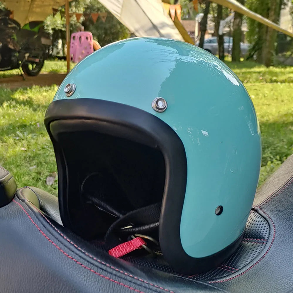 Retro-style glass fibre motorcycle half helmet shown in multiple colour options for adult commuters