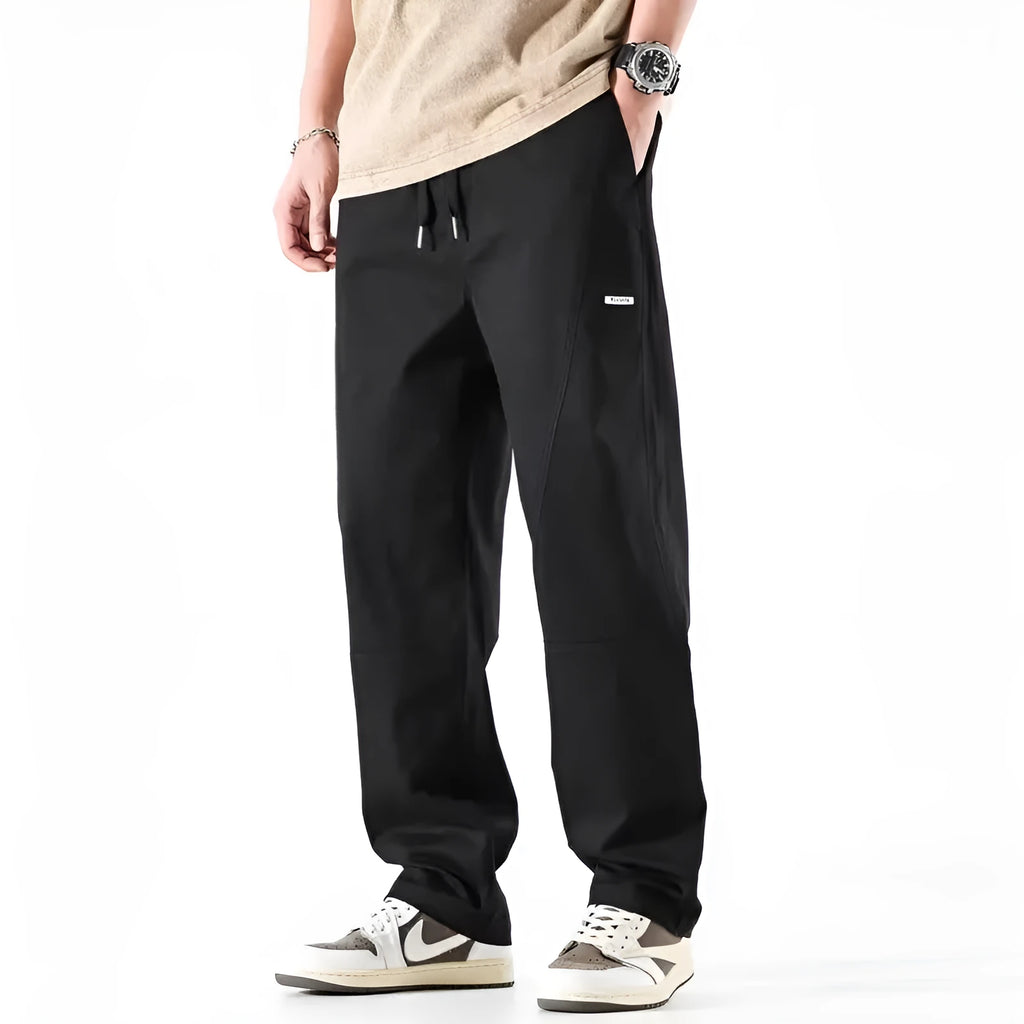 Casual wide-leg cotton trousers in milky white colour showing pants-mouth style