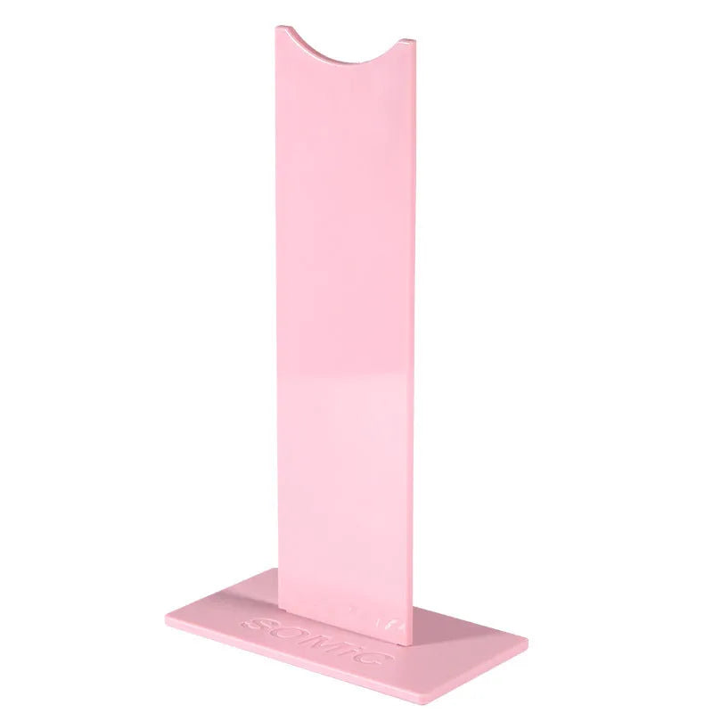 Pink and black detachable head-mounted headphone stand with silicone base