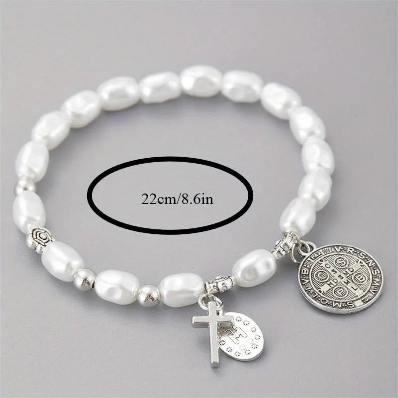 Silver beaded flower bracelet on display with metal links