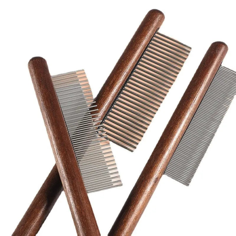 Stainless steel flea comb with dense teeth for removing fleas from a dog's coat