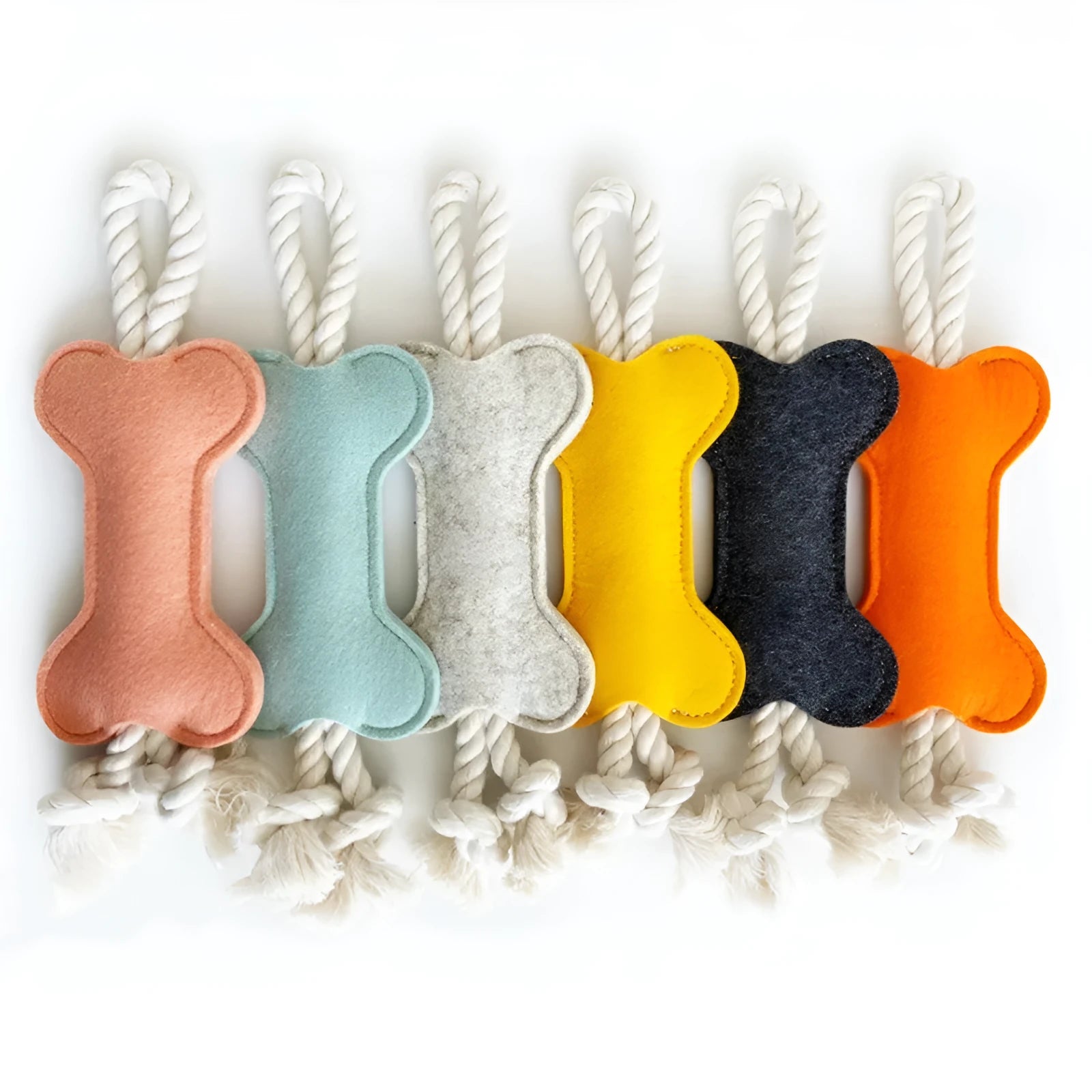 Bone shaped dog toy with rope knot construction in four colour options for bite resistant training
