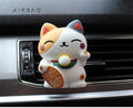 Resin cat car vent aromatherapy clip in black or white with aromatherapy cotton