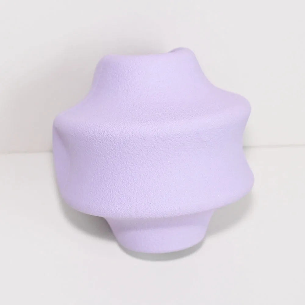 Natural rubber pet food dispensing toy in dark blue, suitable for slow feeding