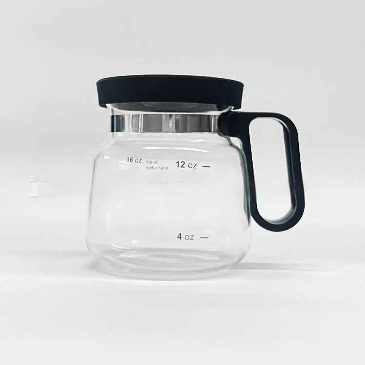 Transparent borosilicate glass coffee maker with silicone cover showing modern simple design