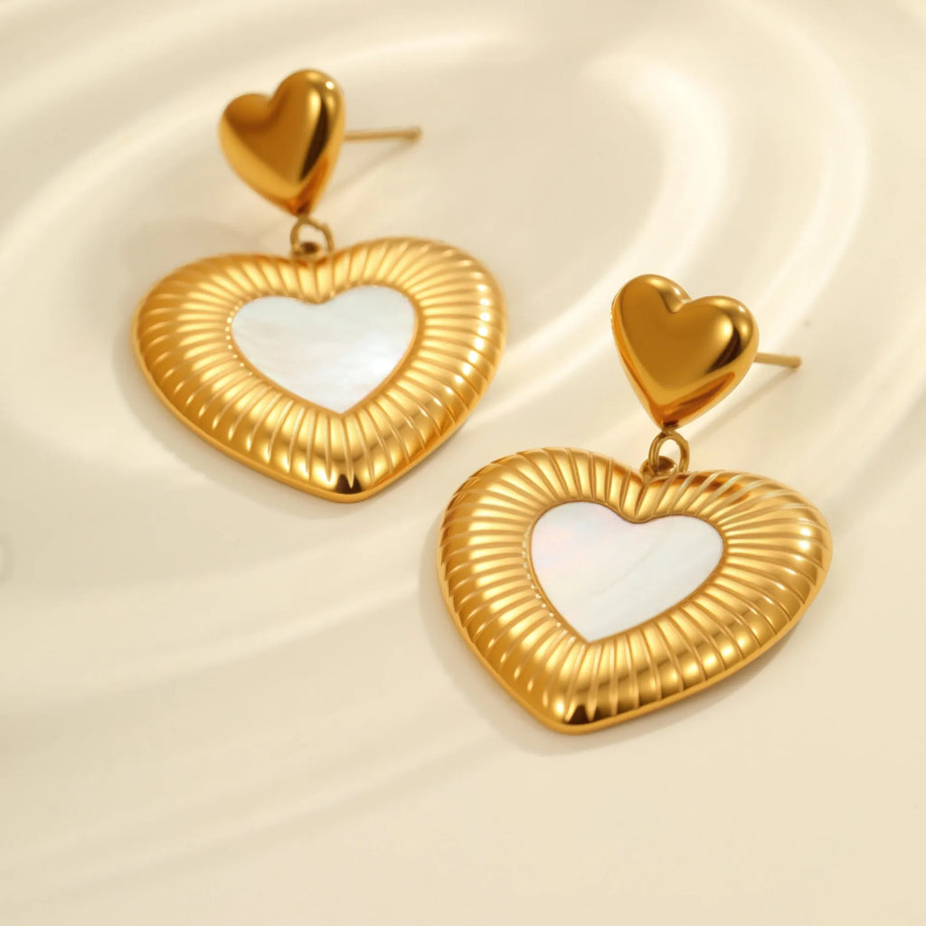 Gold electroplated heart-shaped earrings with fritillary design on stainless steel