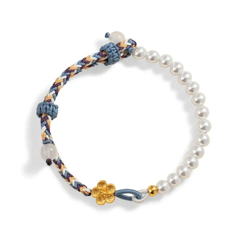 Peach-coloured cord bracelet with sterling silver Chinese flower weaving, chalcedony and pearl details.