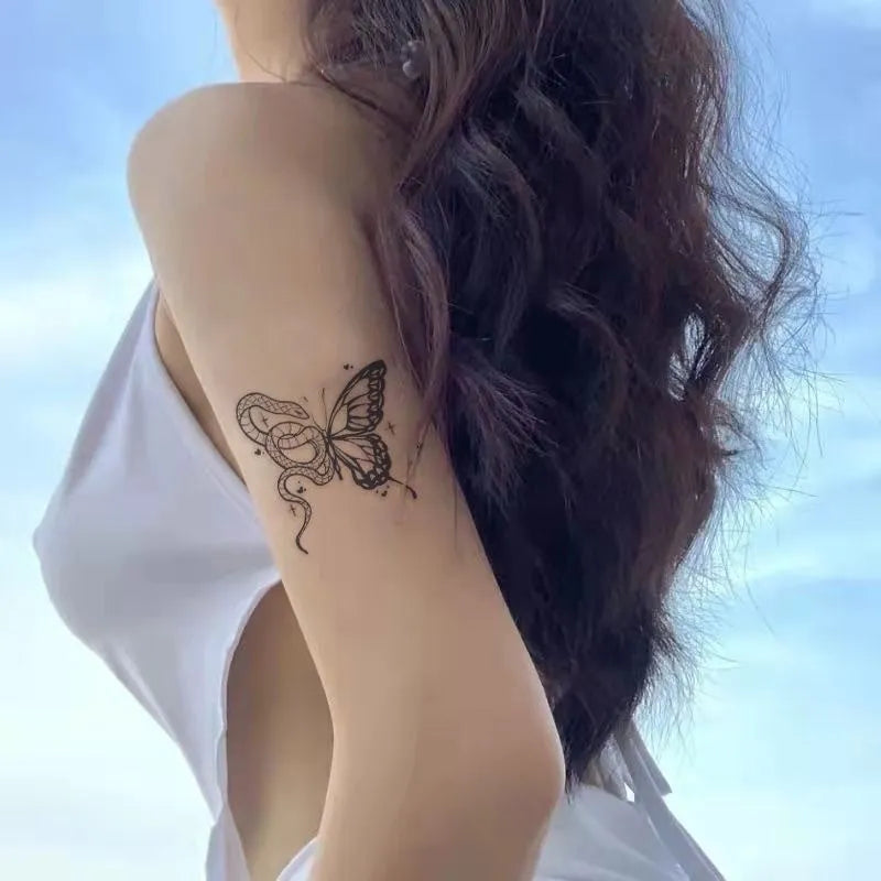 Water transfer tattoo sticker with butterfly and rose pattern, measuring 6.9x9.6cm, for temporary skin decoration.