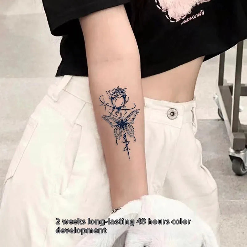Water transfer tattoo sticker with butterfly and rose pattern, measuring 6.9x9.6cm, for temporary skin decoration.