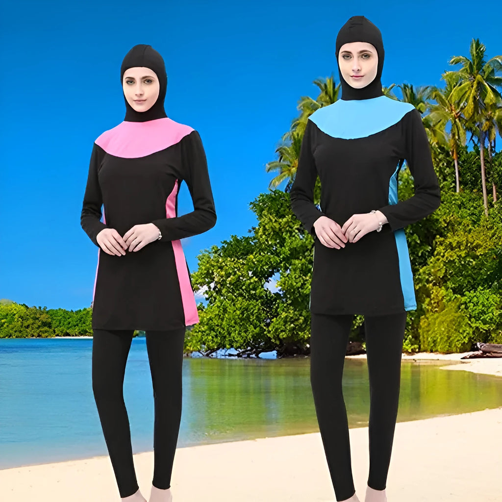 Women's black and blue hooded long sleeve swimsuit top and pants on a hanger.