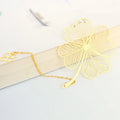 Brass metal bookmark with hollow leaf pattern design in electroplated finish