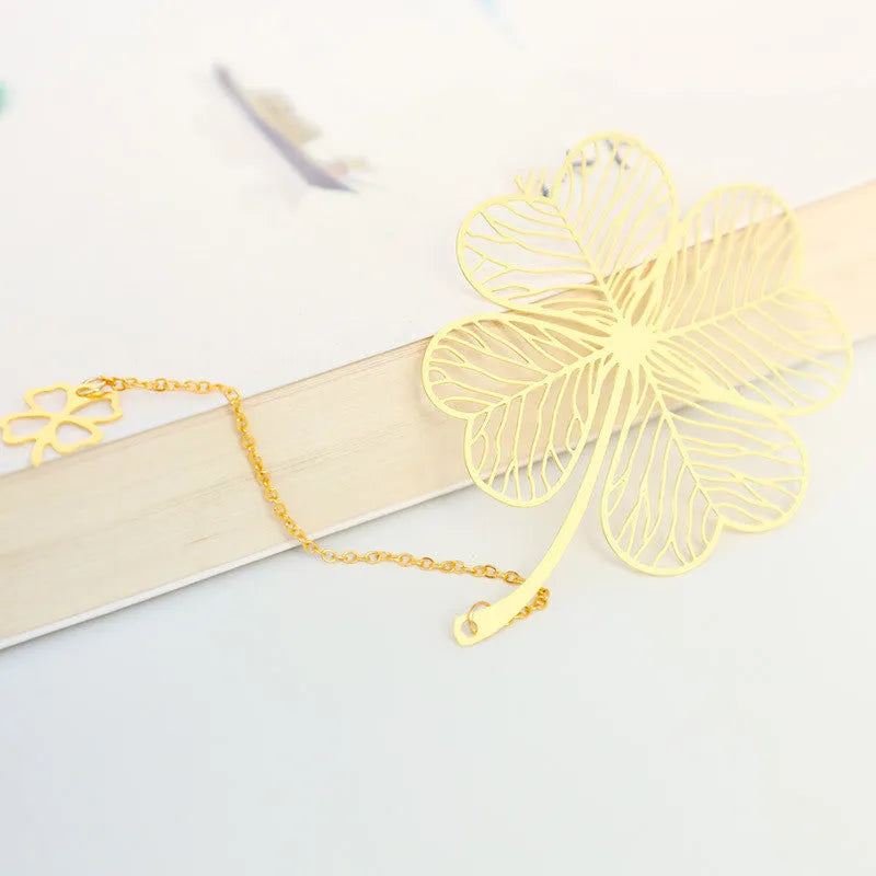 Brass metal bookmark with hollow leaf pattern design in electroplated finish